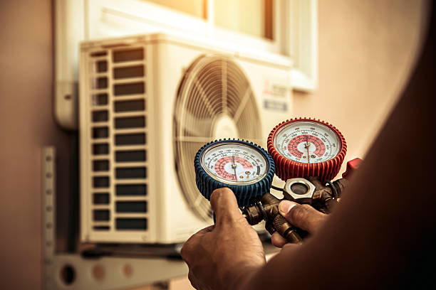 Professional Hvac technician working in Hampton, NY